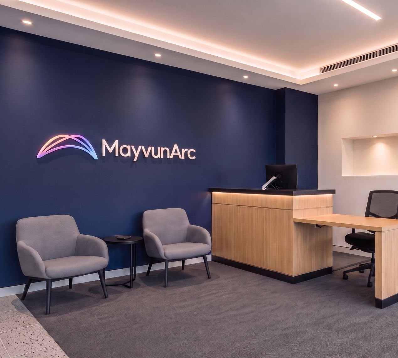 Mayvun Arc office fit-out delivered by FGN, MayvunArc logo on reception wall